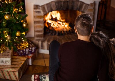 Couple is enjoy bonfire on Christmas Eve