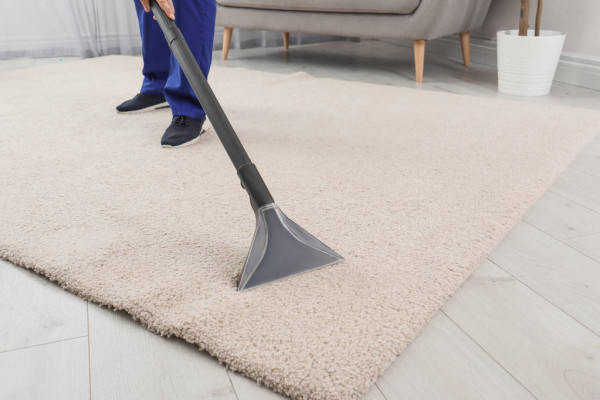 Man Removing Dirt from Carpet, Busy Boys, Professional Cleaners, Coquitlam, BC